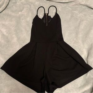 Size small black lace back romper